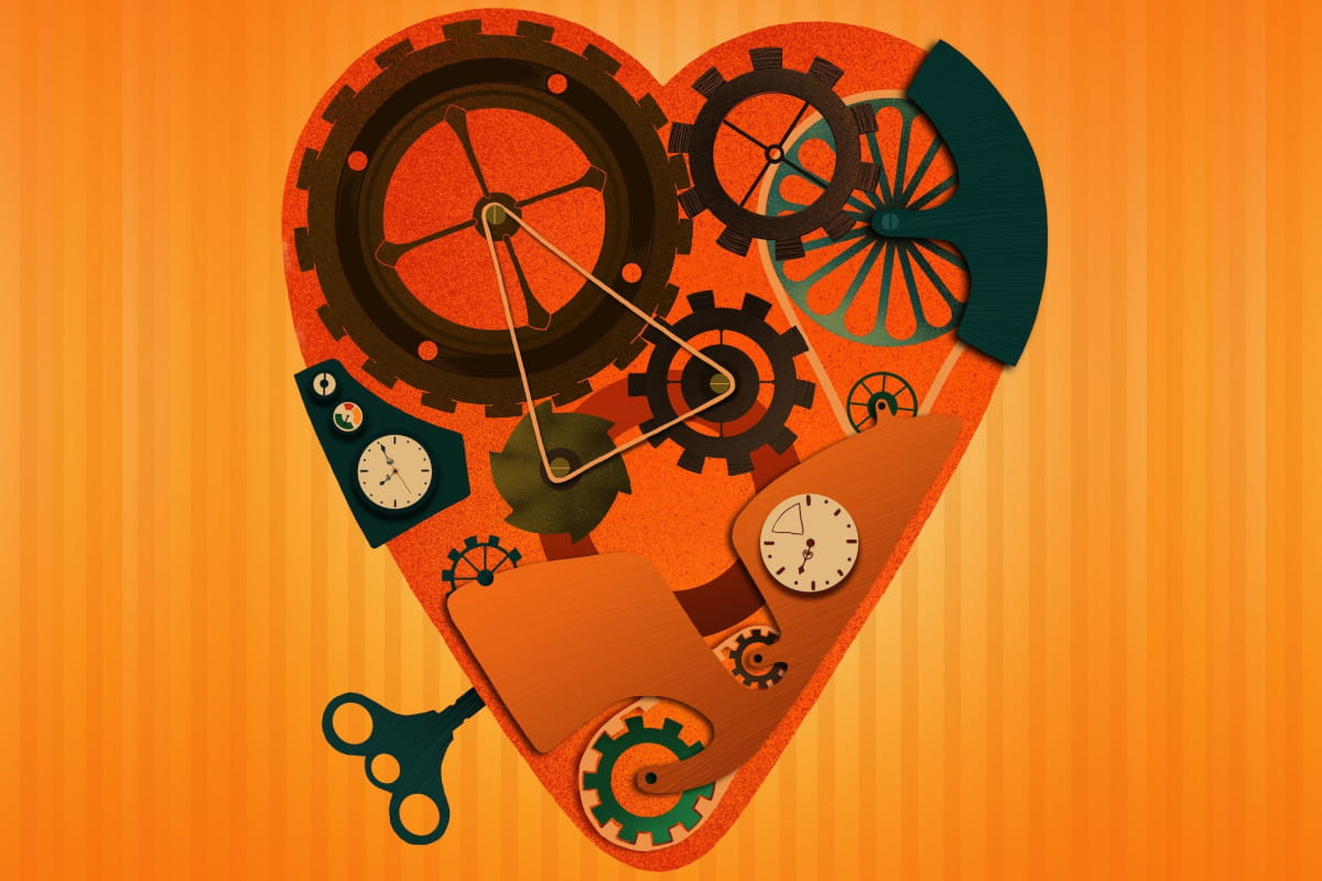 stylized heart of gears and parts against warm orange background