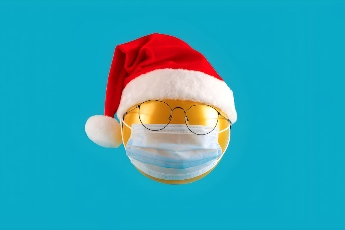 yellow balloon with glasses, Santa hat, and face mask